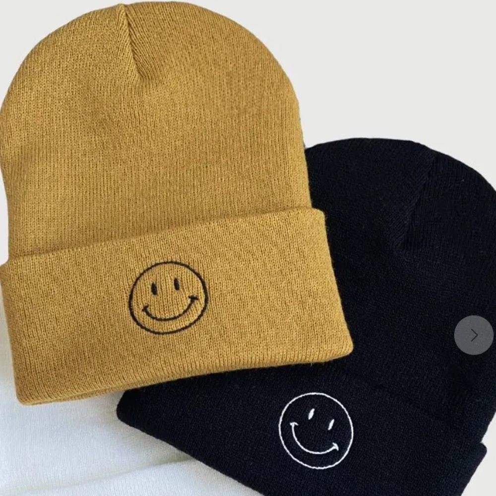 Black beanie with smiley face